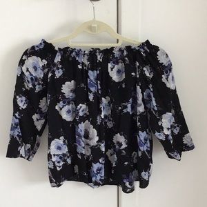 Black off the shoulder shirt with flowers